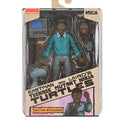 NECA Eastman and Laird's TMNT Baxter Stockman action figure in packaging with computer monitor and alternate head